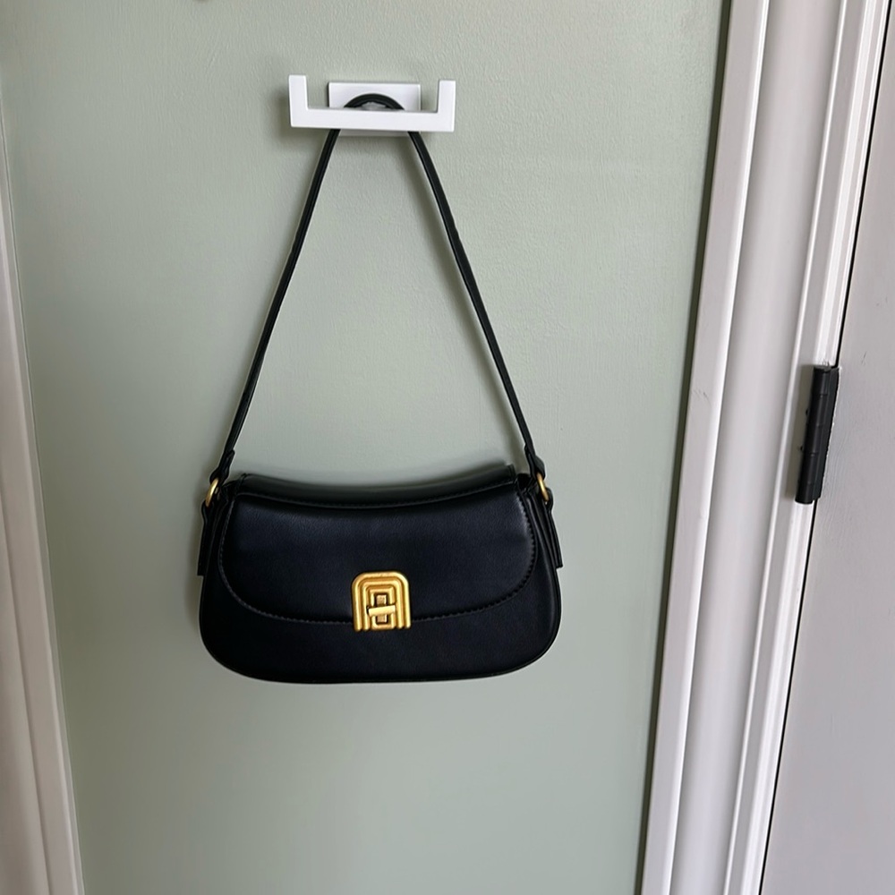 Black and gold shoulder bag